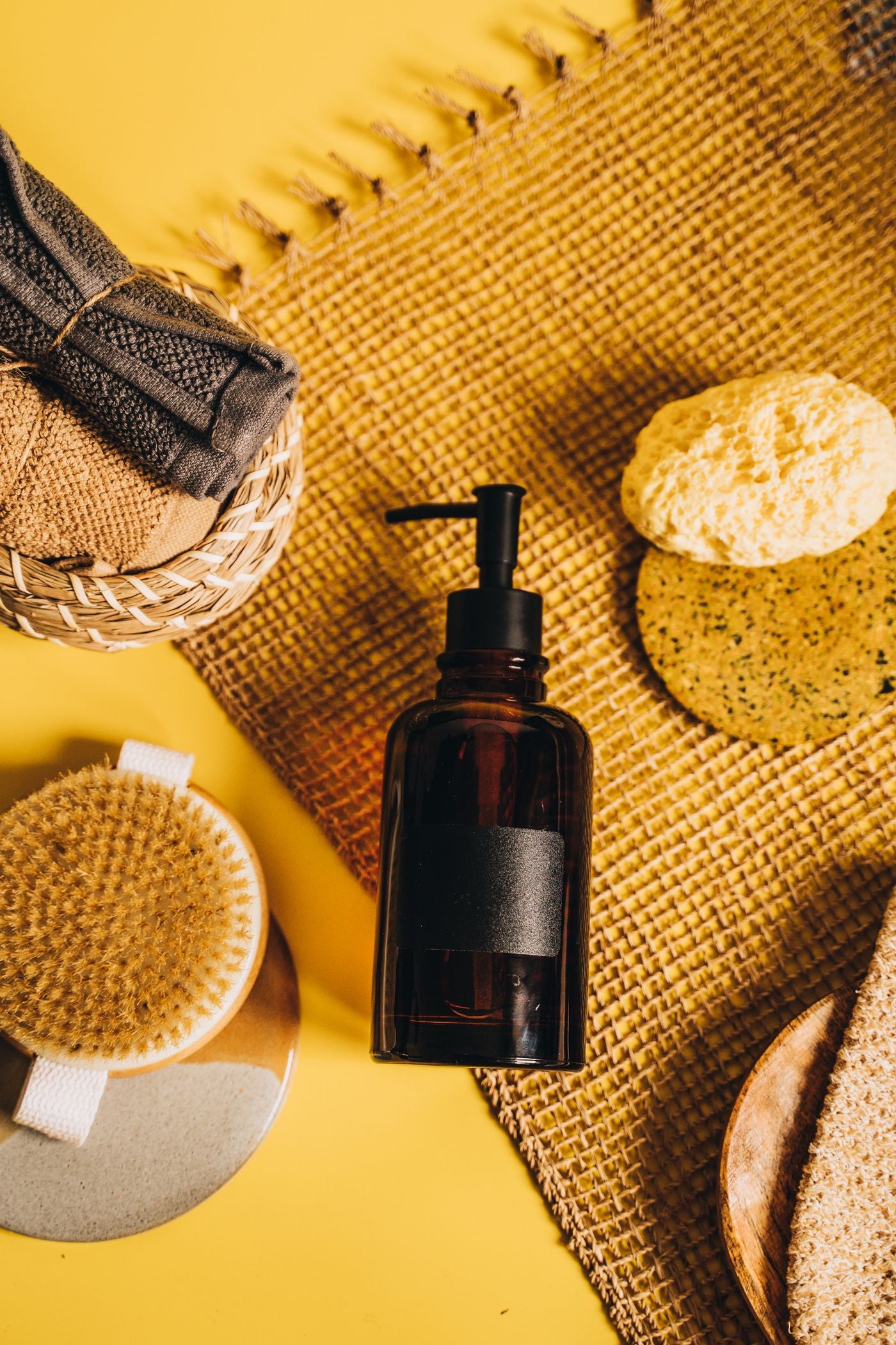 Pump bottle and bath products in a flatlay